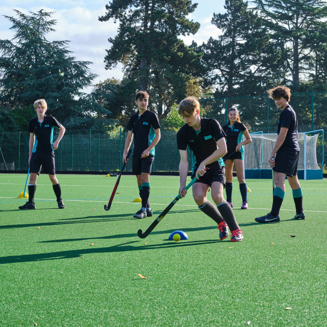 Sport Sixth Form students playing hockey