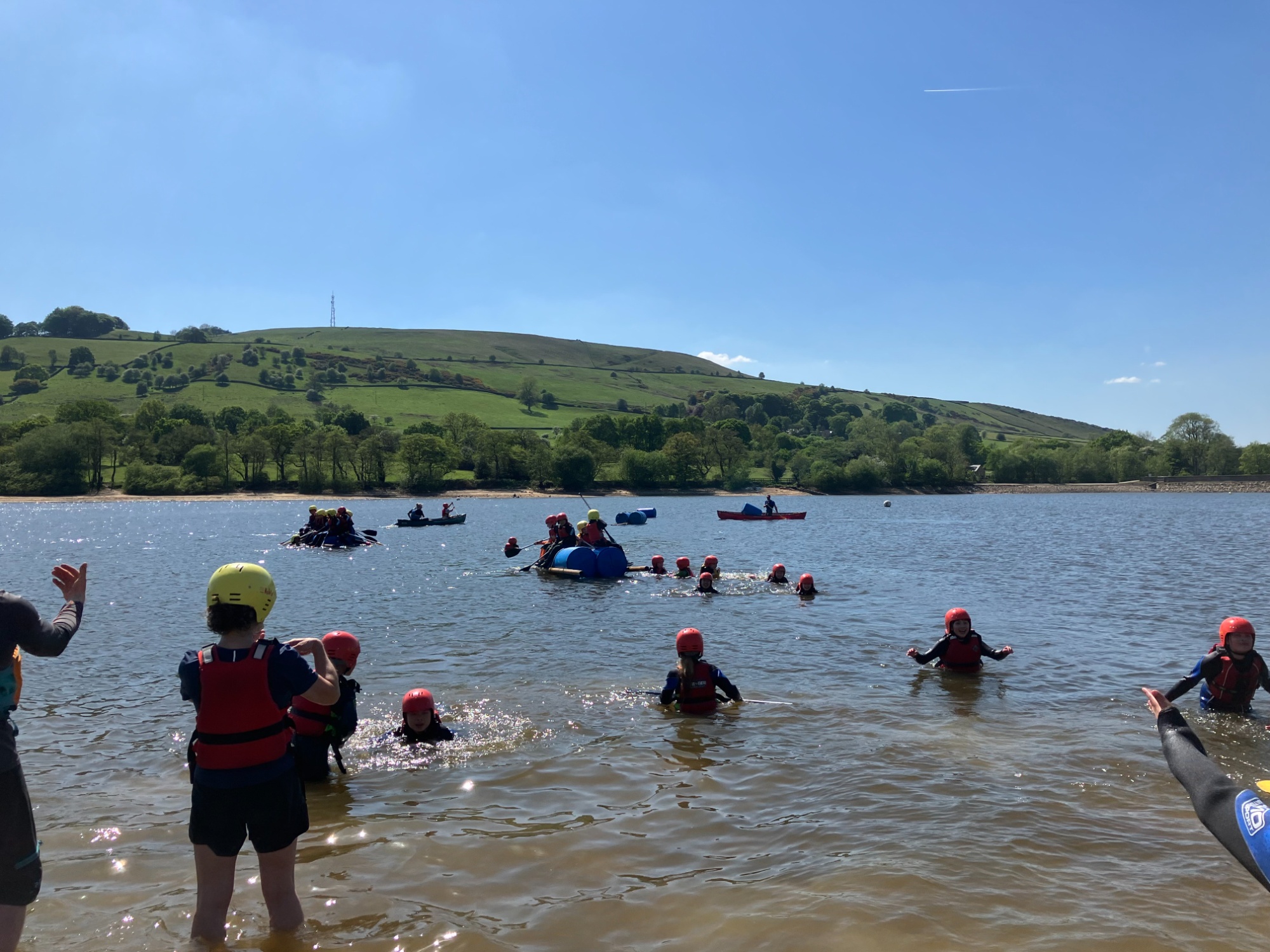Year 5 students in the Peak District building and sailing rafts